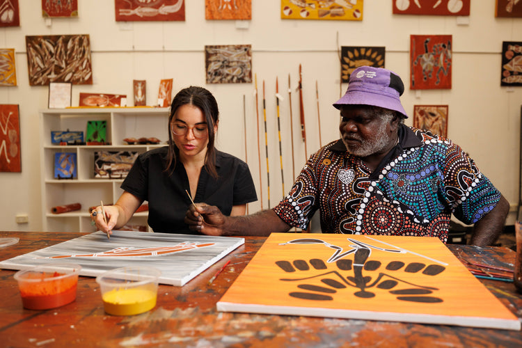 David Cameron Aboriginal Artist painting in Kakadu